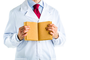 Doctor in white coat showing a blank book