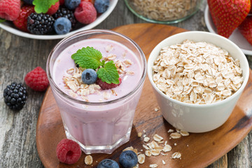 delicious berry smoothies with oatmeal, top view
