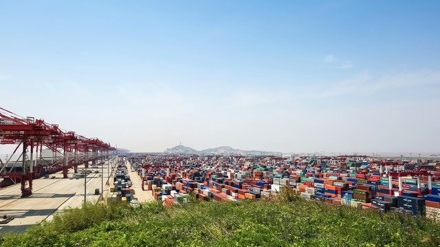 container yard under the blue sky in shanghai, time lapse