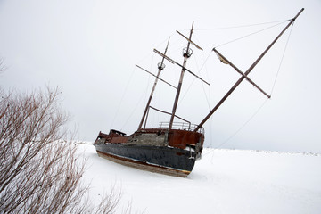 Old Abandoned rusty Sailboat