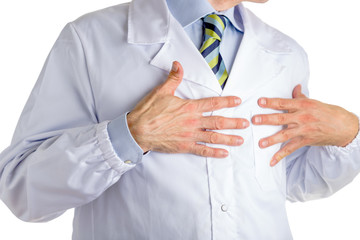 Man in medical coat pointing to his heart with both hands