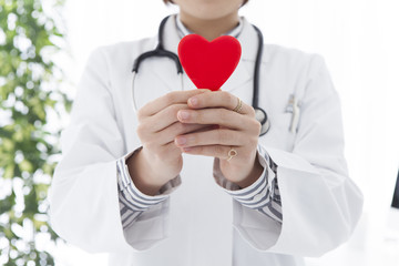 Woman doctor to have a red heart