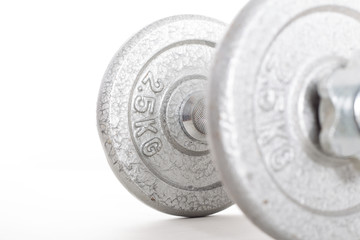 Dumbbell with weight 2.5kg on white background