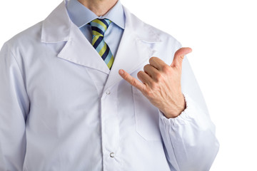 Man in medical coat making shaka gesture