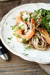 Buckwheat noodles with shrimp on a plate