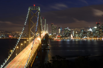 Fototapeta na wymiar San Francisco Bay Bridge and skyline at night