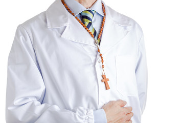 Man in medical coat wearing Rosary beads necklace