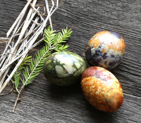 colored easter eggs on vintage country board