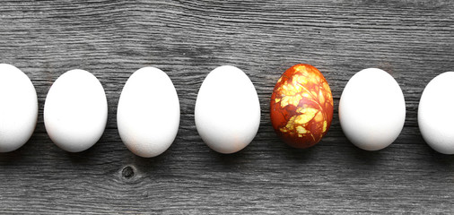 colored easter eggs on vintage country board