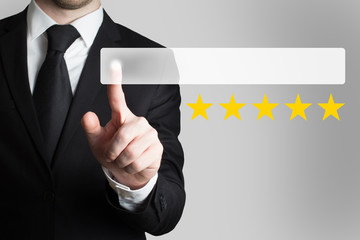 businessman pushing flat button five rating stars