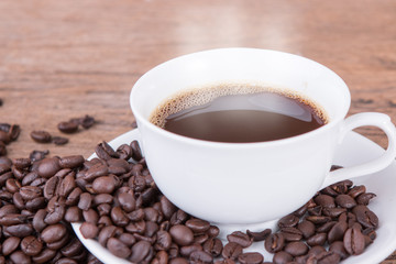 Coffee cup and saucer on a wooden table