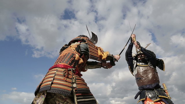 fight two Japanese samurai in the background of sky with clouds