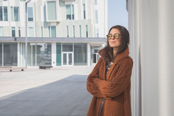 Fototapeta premium Beautiful girl posing in an urban context