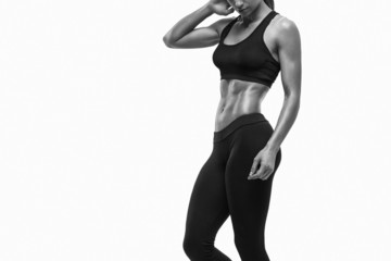 Fitness sporty woman showing her well trained body