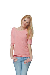 Smiling casual female in jeans and tshirt, over white studio bac