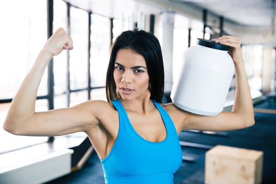 Fit Woman Showing Her Muscles