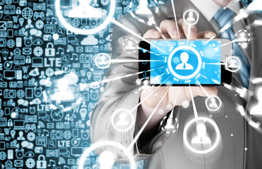Business Hand holding a phone show the social network