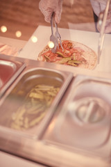 Preparing shawarma
