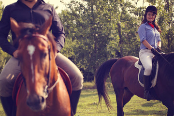 Obraz premium Couple riding their horses