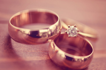 Beautiful golden engagement and wedding rings