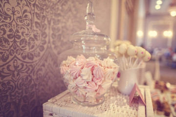 White and pink marshmallows in a jar