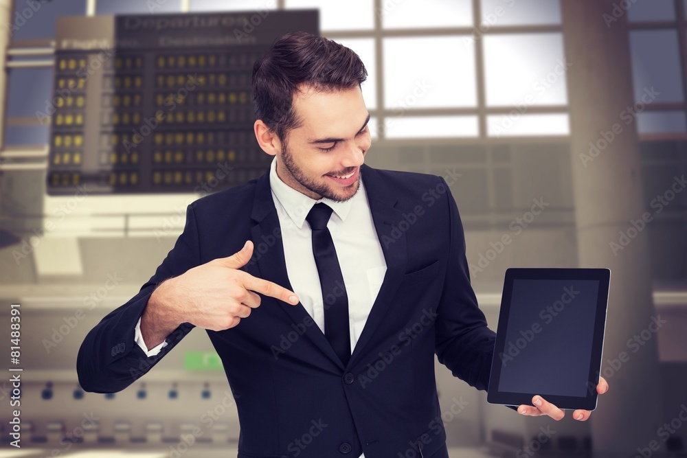Aufkleber composite image of happy businessman pointing with his tablet