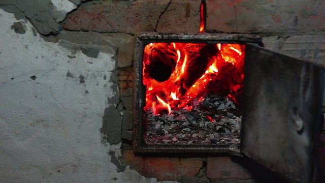 Firewoods burn in oven