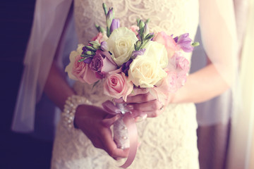 Bride holding wedding bouquet
