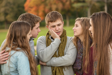 Perplexed Teen with Friends