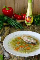 Homemade soup of fish and pearl barley