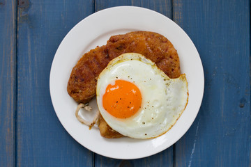 fried alheira with egg