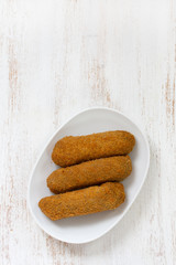 meat croquete on plate