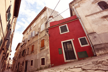 Fototapeta na wymiar Old buildings on the street