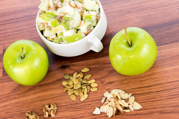 apple salad with almonds, walnuts and pumpkin seeds