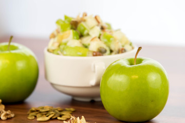 apple salad with almonds, walnuts and pumpkin seeds