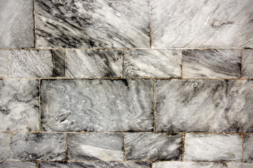 square gray granite wall