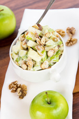 apple salad with almonds, walnuts and pumpkin seeds