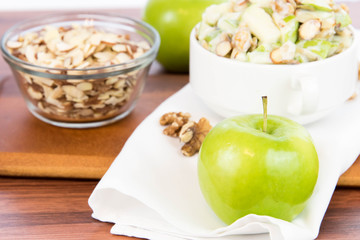 apple salad with almonds, walnuts and pumpkin seeds