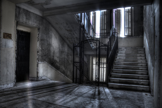 staircase and elevator shaft shadows and light