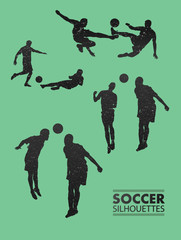 Soccer silhouettes in green vector