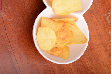 Potato chips. Close up, unhealthy food concept