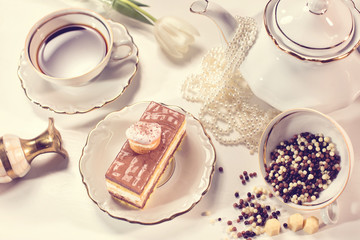 Obraz na płótnie Canvas Tiramisu cake on beautifully deocorated table