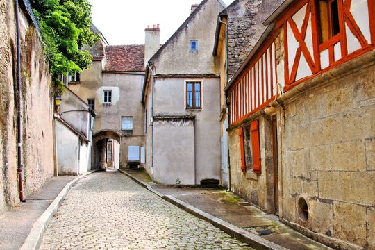 Old cobblestone lane in Semur en Auxois, Burgundy, France
