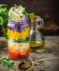 Bright rainbow salad  of tomatoes, carrots, pepper, red cabbage,