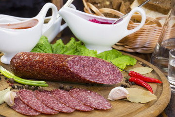 sausage on a wooden plate in a restaurant