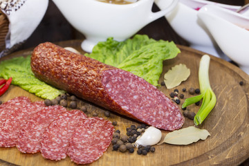 sausage on a wooden plate in a restaurant