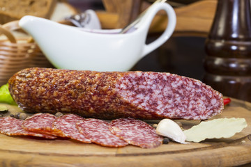 sausage on a wooden plate in a restaurant