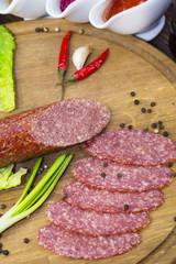 sausage on a wooden plate in a restaurant