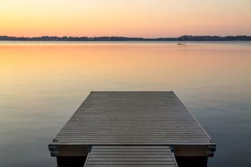 Printed kitchen splashbacks Lake / Pond Wooden pier in the Scandinavian evening lake
