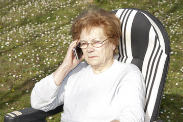 woman with mobile phone outdoors